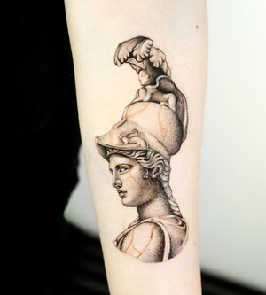 Get inked with a stunning blackwork illustration of a woman statue on your forearm by the talented artist Oek.