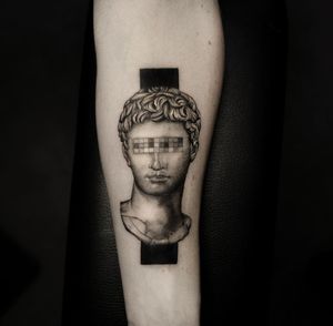 Experience the blend of realism and surrealism in Oek's blackwork illustrative tattoo on your arm.