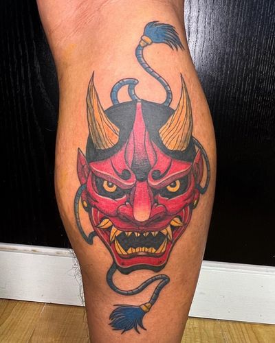 Intricately designed hannya mask tattoo by Brian Daka, exuding traditional Japanese style and craftsmanship.