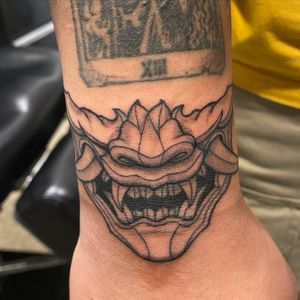 Exquisite blackwork Hannya design by Brian Daka, beautifully crafted for your forearm. Traditional Japanese style meets modern artistry.
