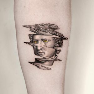 Embrace the surreal with a striking blackwork statue tattoo on your forearm by the talented artist Oek.
