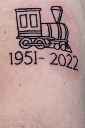 Memorial tattoo of a train for Dad. 