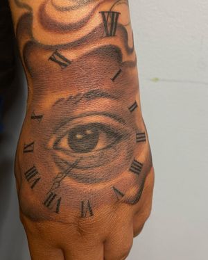 Get a stunning black and gray hand tattoo by the talented artist Carlos Hernandez for a realistic and striking look.