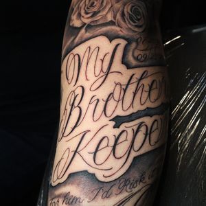 Get a unique lettering tattoo on your forearm with a motivating quote by talented artist Carlos Hernandez.