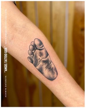 Baby Footprint Tattoo By Ashwin At Angel Tattoo Goa - Best Tattoo Artist in Goa- Best Tattoo Studio in Goa••𝐅𝐨𝐥𝐥𝐨𝐰 𝐅𝐨𝐫 𝐌𝐨𝐫𝐞 ⤵️@angeltattoostudiogoa ••𝐁𝐞𝐬𝐭 𝐐𝐮𝐚𝐥𝐢𝐭𝐲 𝐏𝐫𝐨𝐝𝐮𝐜𝐭𝐬 𝐔𝐬𝐢𝐧𝐠 ⤵️@kingstattoosupply @dynamiccolor @worldfamousink @kwadron @dermalizepro @cheyenne_tattooequipment ••𝐂𝐨𝐧𝐭𝐚𝐜𝐭 𝐅𝐨𝐫 𝐁𝐨𝐨𝐤𝐢𝐧𝐠 ☎️𝟗𝟗𝟔𝟎𝟏𝟎𝟕𝟕𝟕𝟓 | 𝟗𝟖𝟑𝟒𝟖𝟕𝟎𝟕𝟎𝟏••𝐎𝐟𝐟𝐢𝐜𝐢𝐚𝐥 𝐖𝐞𝐛𝐬𝐢𝐭𝐞 🌐www.angeltattoogoa.com