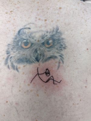 this is my "finished" owl tattoo, that was supposed to be a whole back piece...