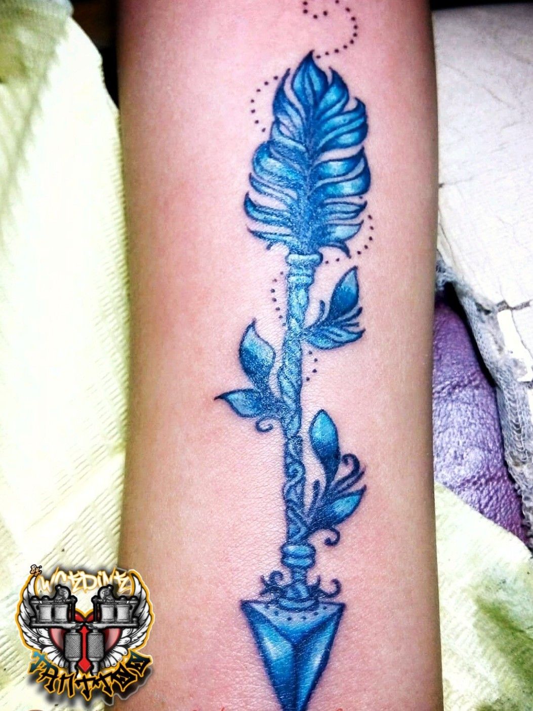 Skull and arrow feather tattoo by Jaya Suartika - Tattoogrid.net