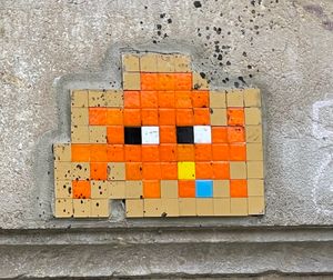 I’ve admired Invader art for years, all over the world.  Would make a great simple tattoo, like Deadmau5 has on his neck.