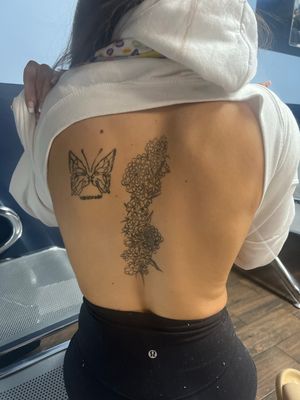 Looking for someone to touch up the spine tattoo, not really sure what to do to change it cause i don’t love the design. And touch up to the butterfly as well.  