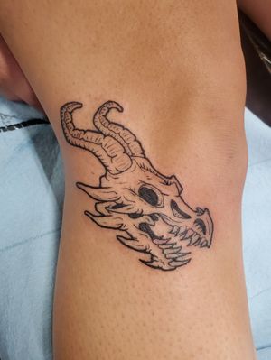 Cute little illustrative dragon skull.That's about it.Oh, this stuff is my bread and butter. I loooove doing it!