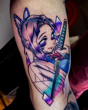 Beautiful upper arm tattoo featuring a butterfly, sword, girl, and shinobu motif by Fabian Lopez Barreda.