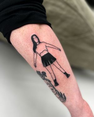 Get a haunting blackwork girl tattooed on your forearm by the talented Miss Vampira. A perfect mix of horror and illustrative styles.