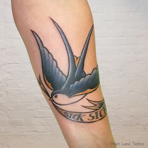 new school swallow tattoo, marc lane, bird tattoo
