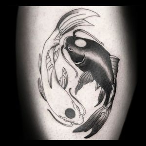 Dive into the world of blackwork with a stunning illustrative koi fish tattoo by Drone. Embrace the beauty of Japanese art on your arm.