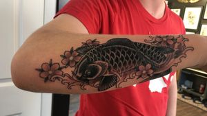 My Black and Grey Japanese Koi Fish done by Tanner Kunz at Handmade tattoo in Lincoln, NE #cherry blossoms #waves