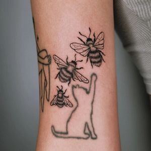Adorn your arm with a fine line, illustrative bee tattoo by the talented artist Erin. Embrace the beauty of nature in this stunning design.