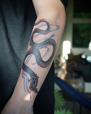 𝙄𝙂: 𝙣𝙖𝙩𝙚_𝙩𝙝𝙖𝙞𝙡𝙖𝙣𝙙 🌿 Blackwork Thai Naga tattoo with abstract flow by Thai tattoo artist in Chiang Mai, Thailand