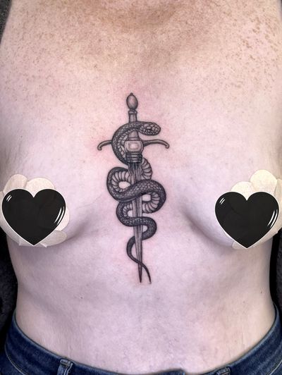 A classic snake and dagger combo . #snaketattoo #daggertattoo #chesttattoo #snakeanddagger #snakeanddaggertattoo