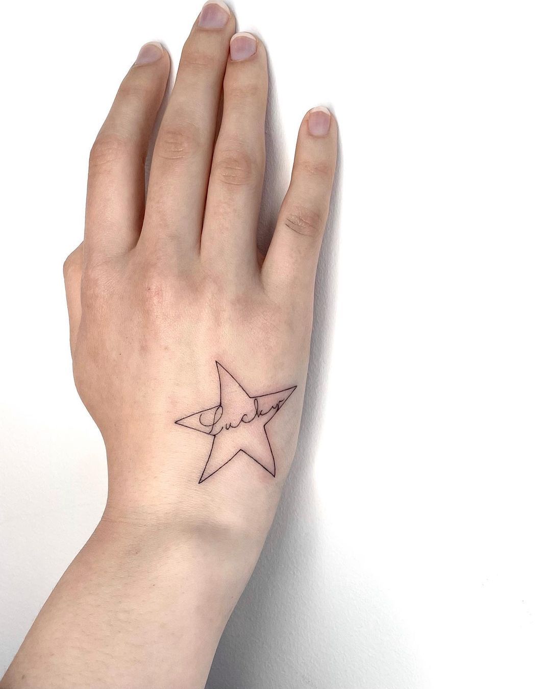 small star tattoos for girls on wrist