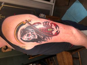 Tattoo by Needles and Skulls tattoo