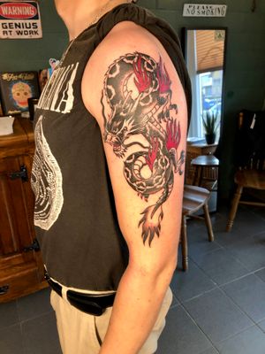 Tattoo by Needles and Skulls tattoo