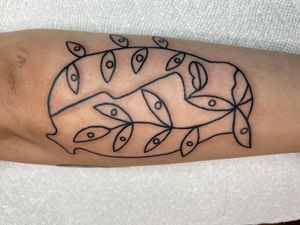Ignite your imagination with a surreal fine line forearm tattoo of a leaf by Ermis Atzemoglou.
