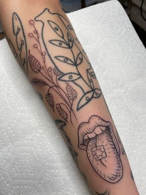 Elegant and delicate fine line tattoo featuring a leaf and vase motif, expertly done by Ermis Atzemoglou on the forearm.