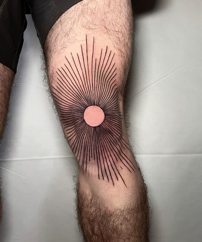 Explore the beauty of fine line art with this geometric sun knee tattoo by Ermis Atzemoglou. A unique combination of sun motif and intricate patterns.