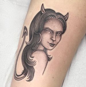 Get inked with a stunning black and gray neo traditional forearm tattoo featuring a devil and woman design by Sophie Rose Hunter.