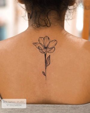 woman back tattoo