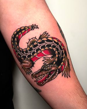 Traditional alligator tattoo by our resident @nicole__tattoo Books/info in our Bio: @southgatetattoo • • • #alligatortattoo #alligator #traditionaltattoo #southgatepiercing #london #londontattooartist #southgate #southgatetattoo #sgtattoo #londontattoo