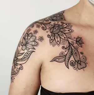 Elegant ornamental design featuring a beautiful flower motif by Karen Buckley. Perfect for shoulder placement.