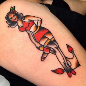 Classic anchor and pin up girl design by Alessandro Lanzafame, perfect for upper arm placement.