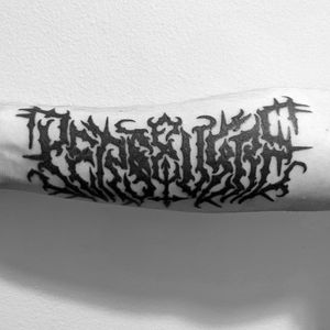 Get a unique forearm tattoo with blackwork, illustrative lettering by Shane. Stand out with this personalized design.