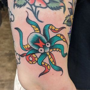 Get a stunning Japanese illustrative octopus tattoo on your ankle by the talented artist Shane.