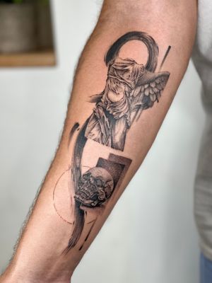 A bold blackwork forearm tattoo featuring a skull, angel, and statue in illustrative style by Lawrence.
