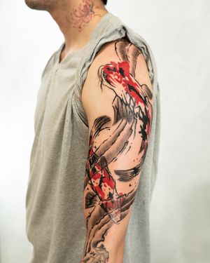 Get a stunning illustrative koi fish tattoo on your arm by the talented artist Kotaro. Embrace the beauty and symbolism of this traditional Japanese design.