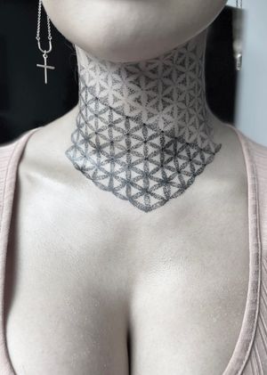 Unique pattern tattoo on neck in blackwork and illustrative style by Lawrence.