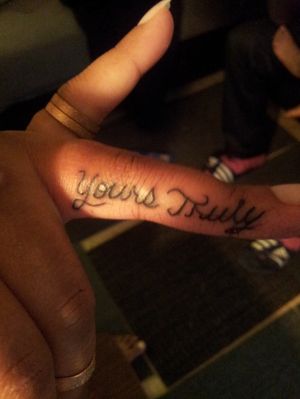 "Yours Truly" (cursive) 