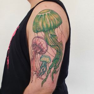 Colorful jellyfish tattooed over scars 