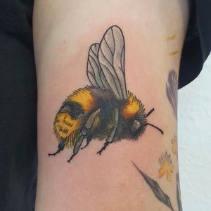 Colorful bumblebee tattoo