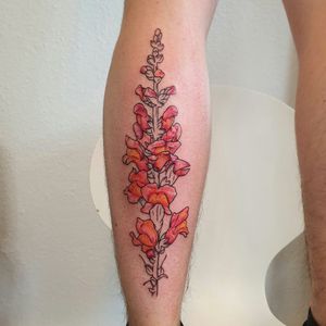 Colorful botanical snapdragon tattoo