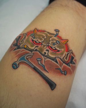 Get hammered with this bold neo-traditional tattoo by the talented Alex Travers. Perfect for your arm!