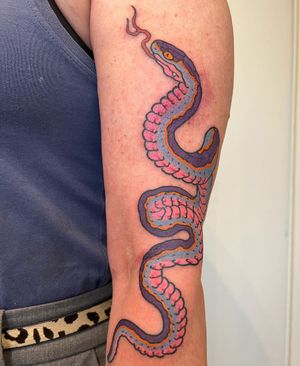 Get a stunning illustrative snake tattoo on your upper arm, designed by the talented artist Kiko Lopes.