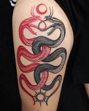 Experience the power and beauty of a Japanese snake tattoo on your upper leg by renowned artist Fernando Joergensen. Embrace the symbolism of transformation and protection. Book your session today!