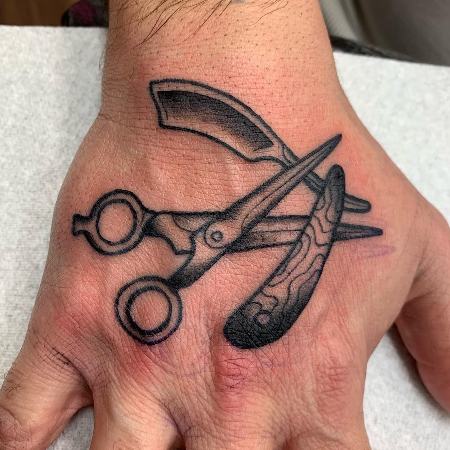 Realistic Finger Scissor Hand Tattoo by Pure Ink Tattoo