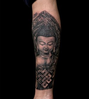 Masterpiece by Avi merging serene buddha with intricate crown and filigree details in black and gray style.