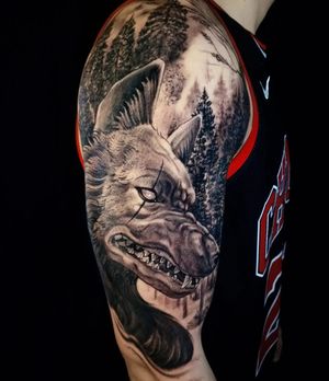 Experience the wilderness with this detailed black and gray piece by Mauro Imperatori. The majestic wolf and towering tree symbolize strength and growth.
