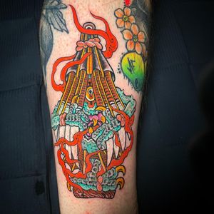 Matthew Ono's striking oni tattoo design for a bold statement on your forearm. Embrace the power of Japanese folklore with this unique piece.