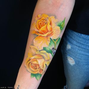 Stunning realism floral design by Marie Terry, perfect for your forearm.